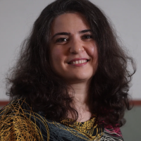 A portrait photograph of Asreen Rostami