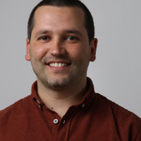A portrait photograph of Joao Guerreiro
