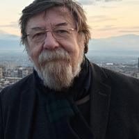 A portrait photograph of Nigel Osborne