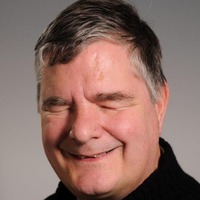 A portrait photograph of Dr Tony Stockman